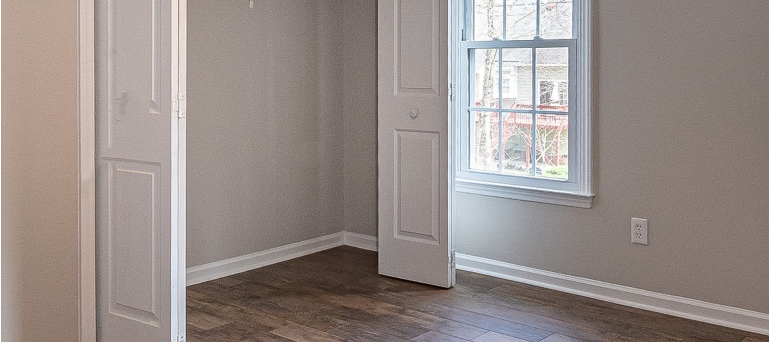 Placeholder photo — an empty, sunlit bedroom ready to show move-in/move-out condition. Swap for a real Magic Maids job-site photo.
